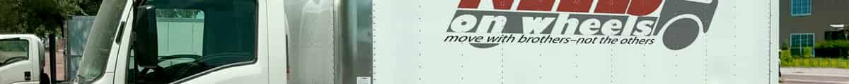 Neels on Wheels Moving logo