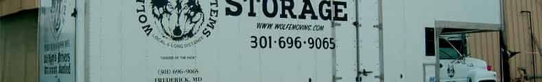 Wolfe Moving Systems  logo