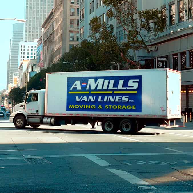 A Mills Van Lines logo (AMV)