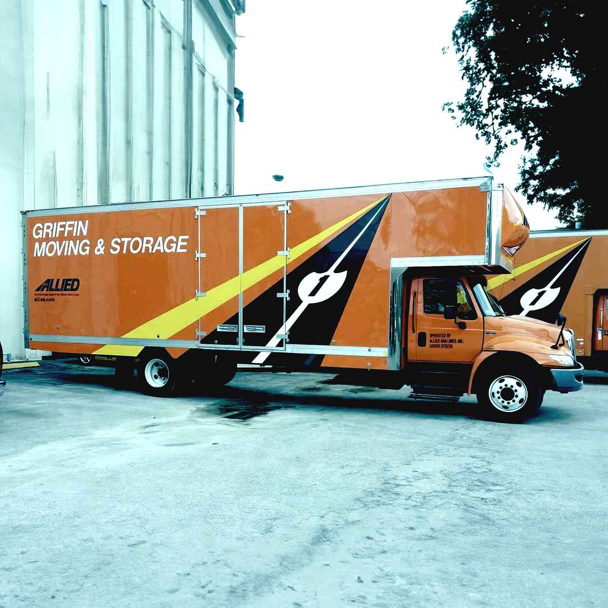 Griffin Moving & Storage logo (GM&)