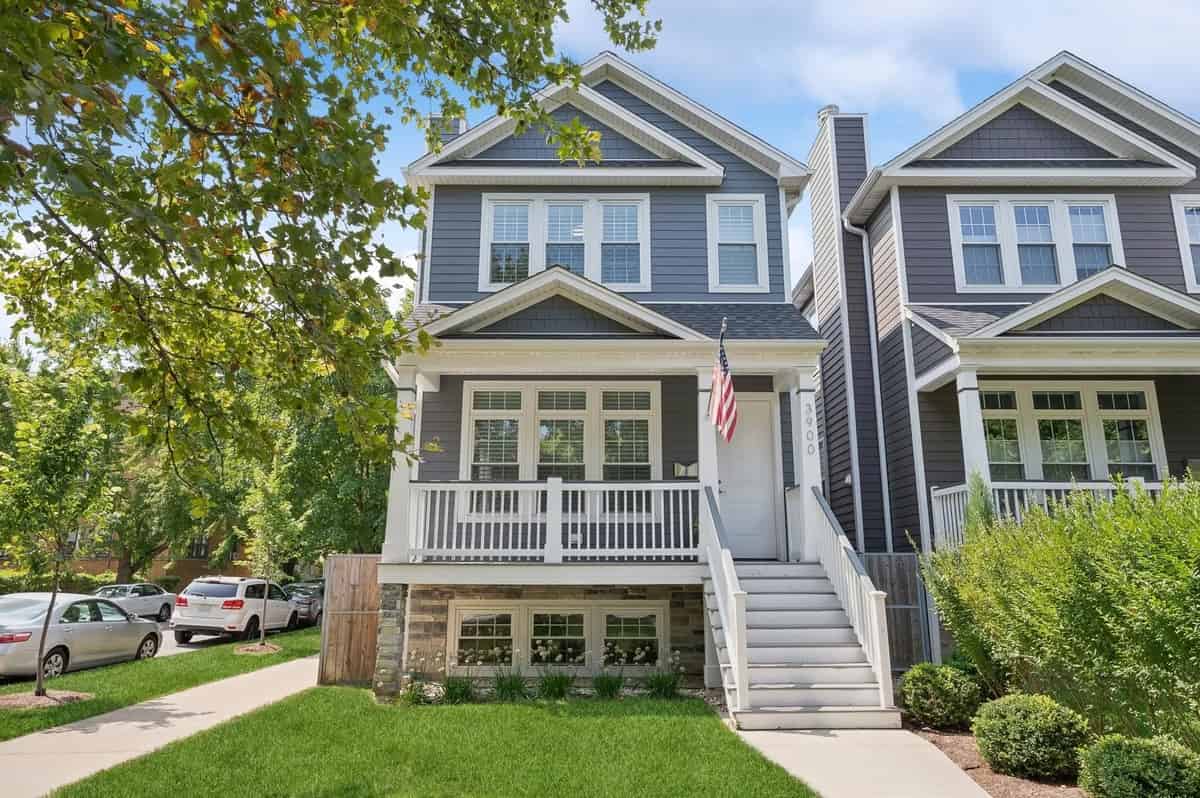 a two story house with a large front yard