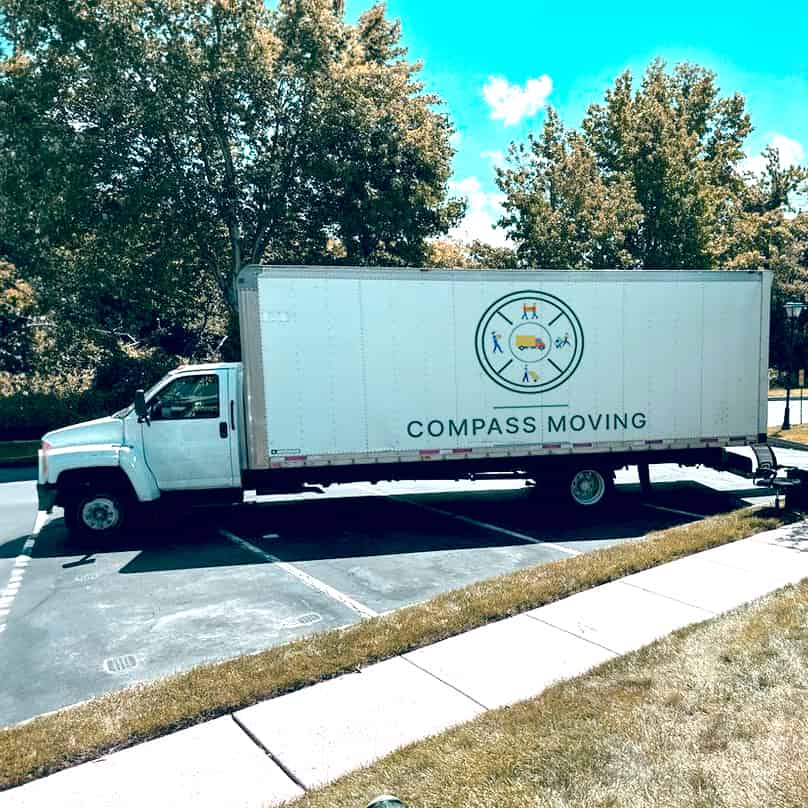 Compass Moving Company logo