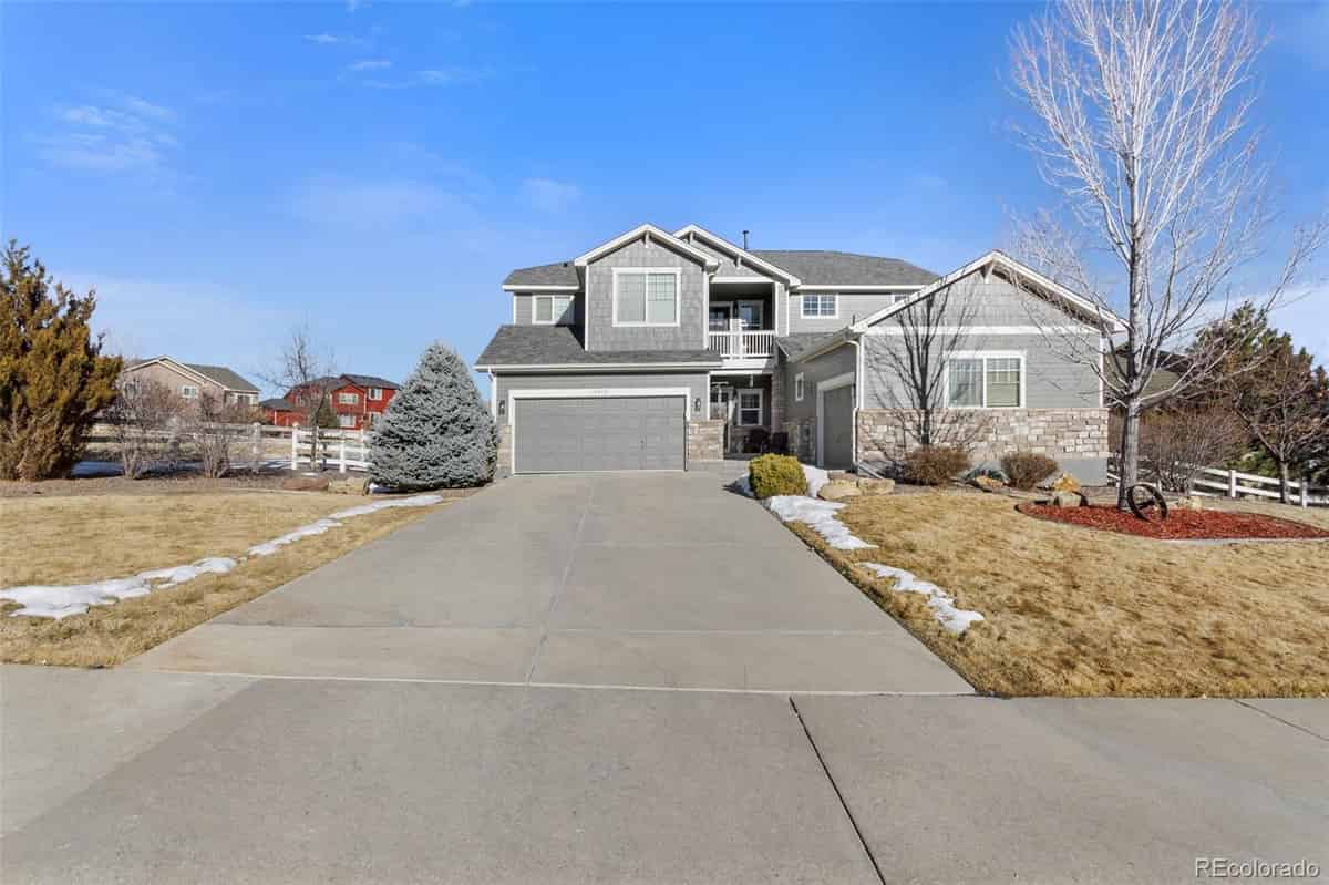 a house with a driveway in front of it