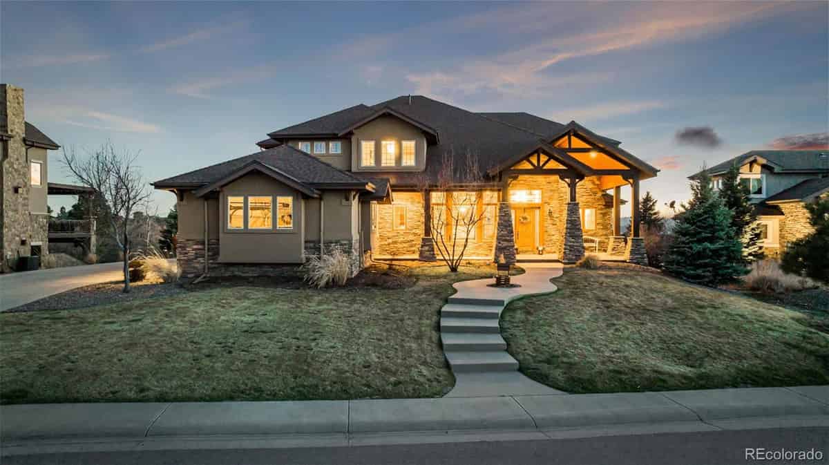 a home in colorado with a stone and stone exterior