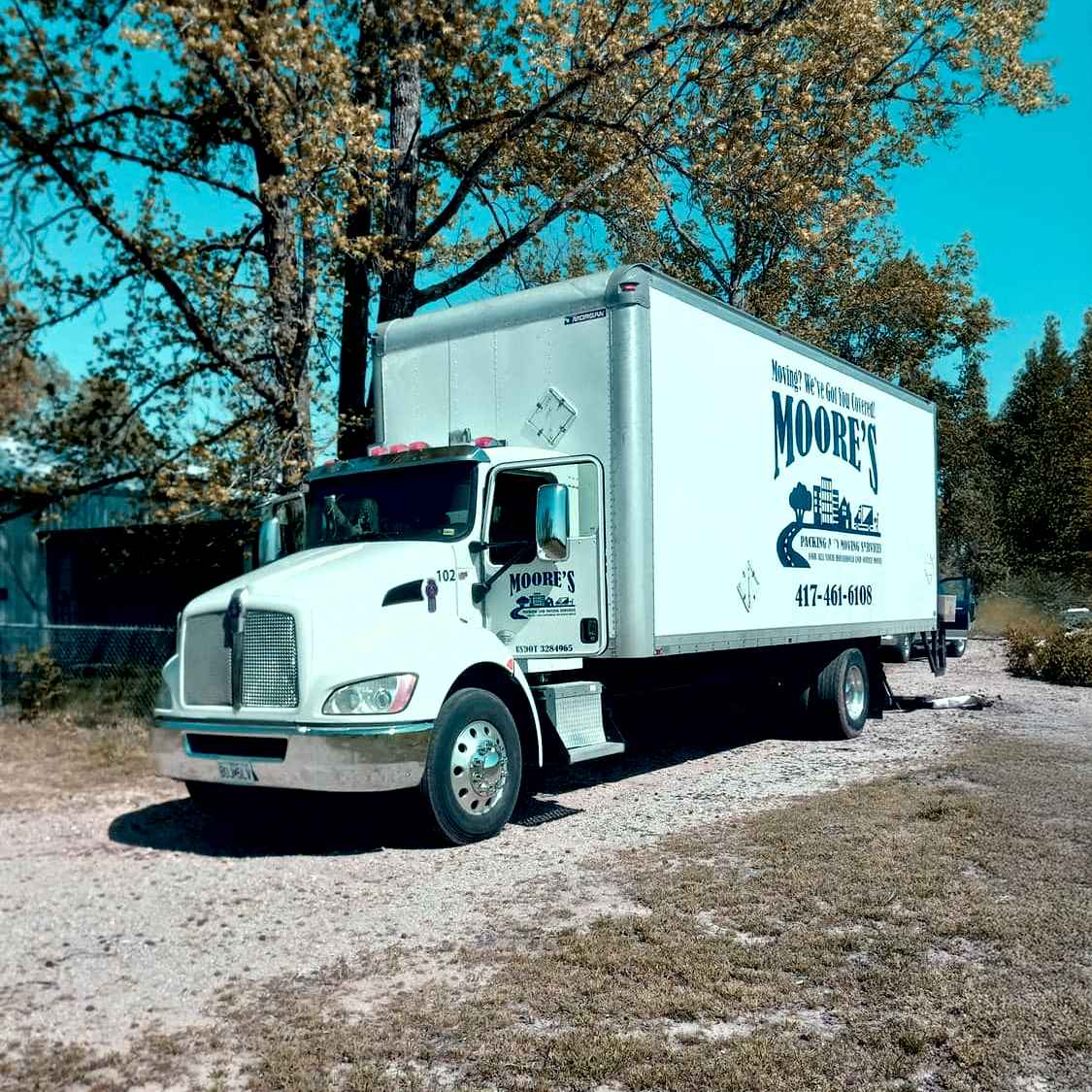 Moore's Packing and Moving Services logo