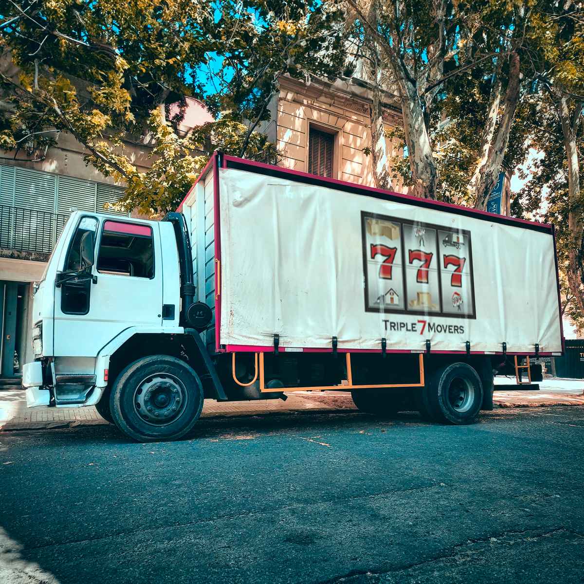 Triple 7 Movers logo