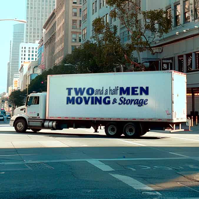 Two and a Half Men Moving & Storage logo