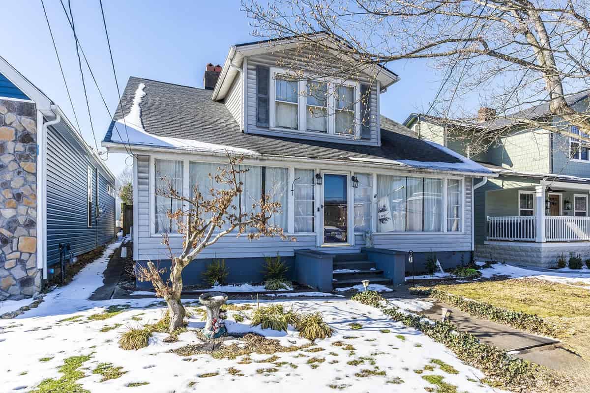 a house with snow on the ground